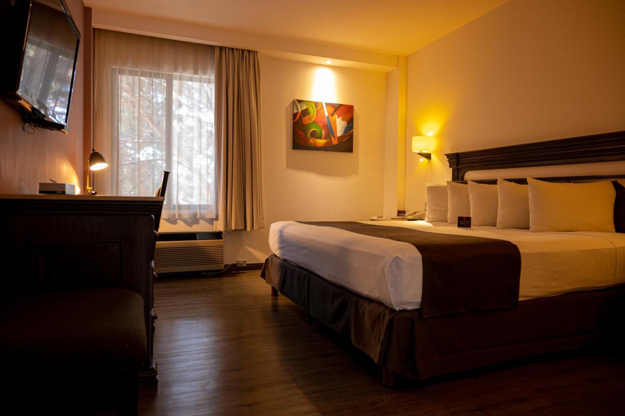 Hotel Victoria Express Durango Quarto foto